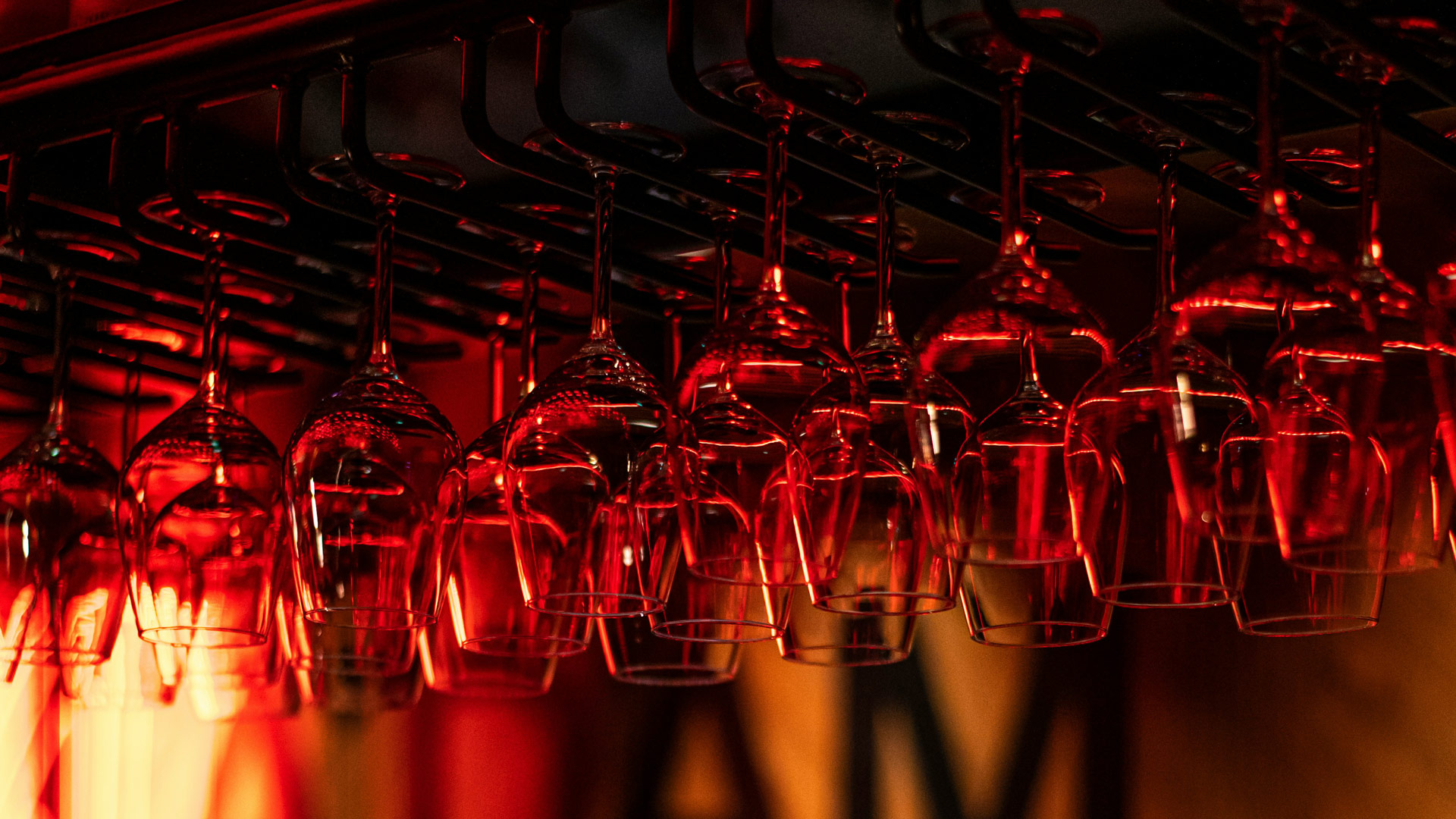 Glasses hanging over the bar